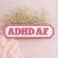 ADHD af plaque
